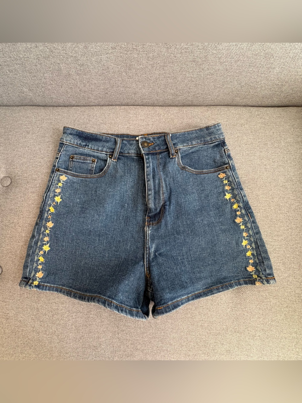 High-Rise Blue Denim Shorts with Yellow Floral Side Embroidery